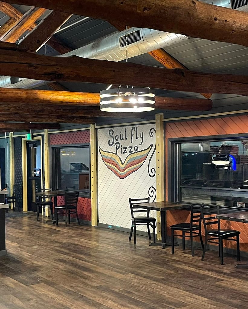 Now Open! Heritage Crust & Riverside Vibes in St. Anthony! painted sign inside Soul Fly Pizza Co in St. Anthony, ID